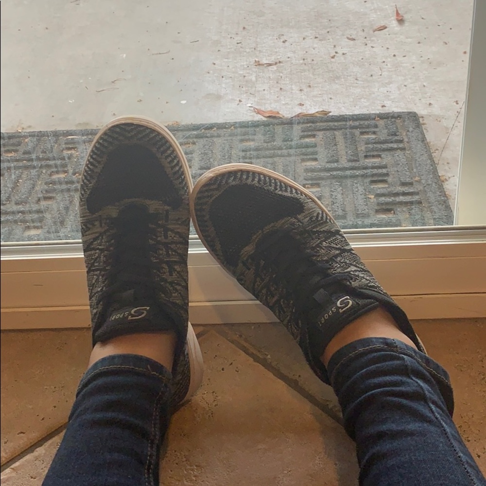 Black, grey and a little white sneakers